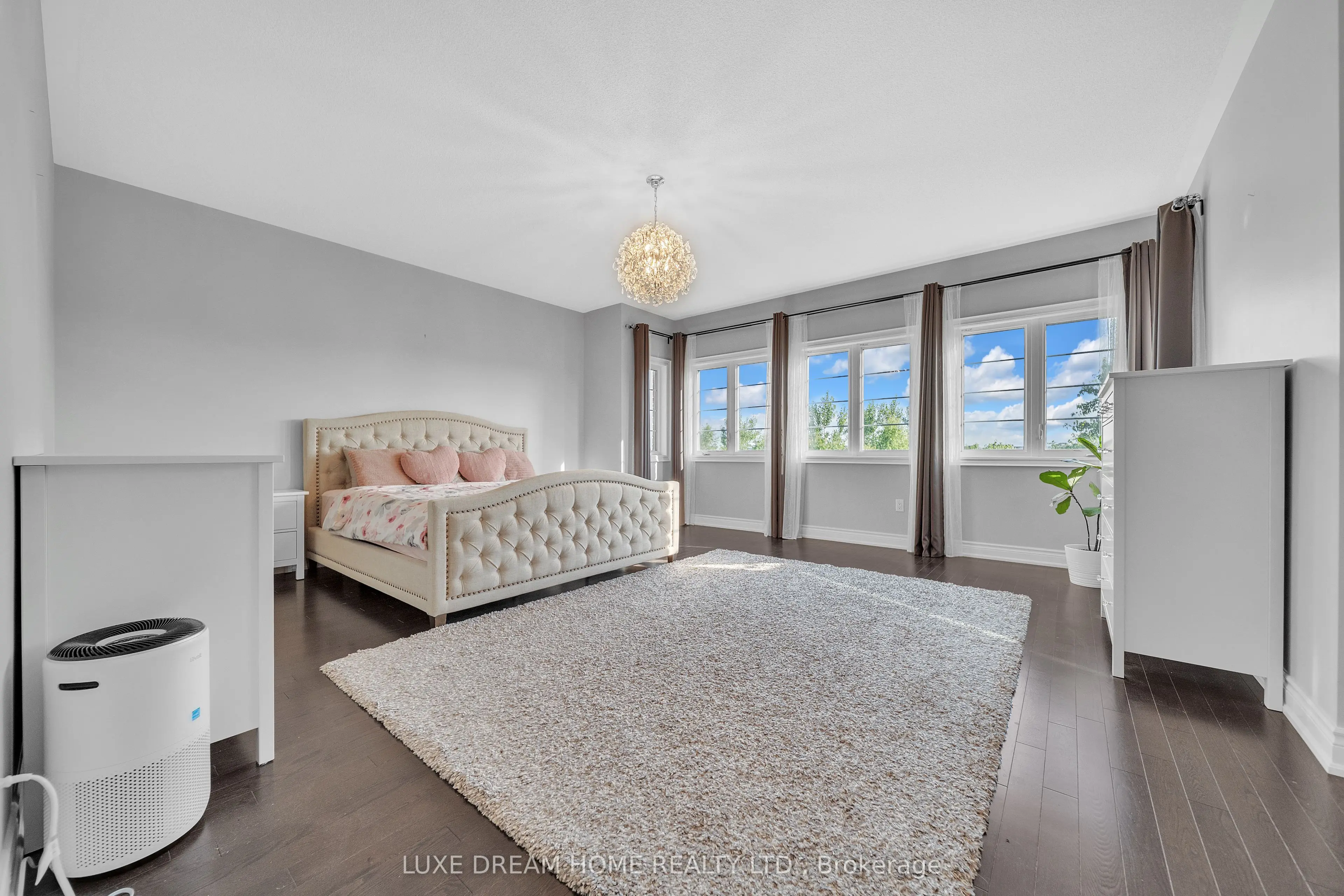 Luxury staged master bedroom in GTA home